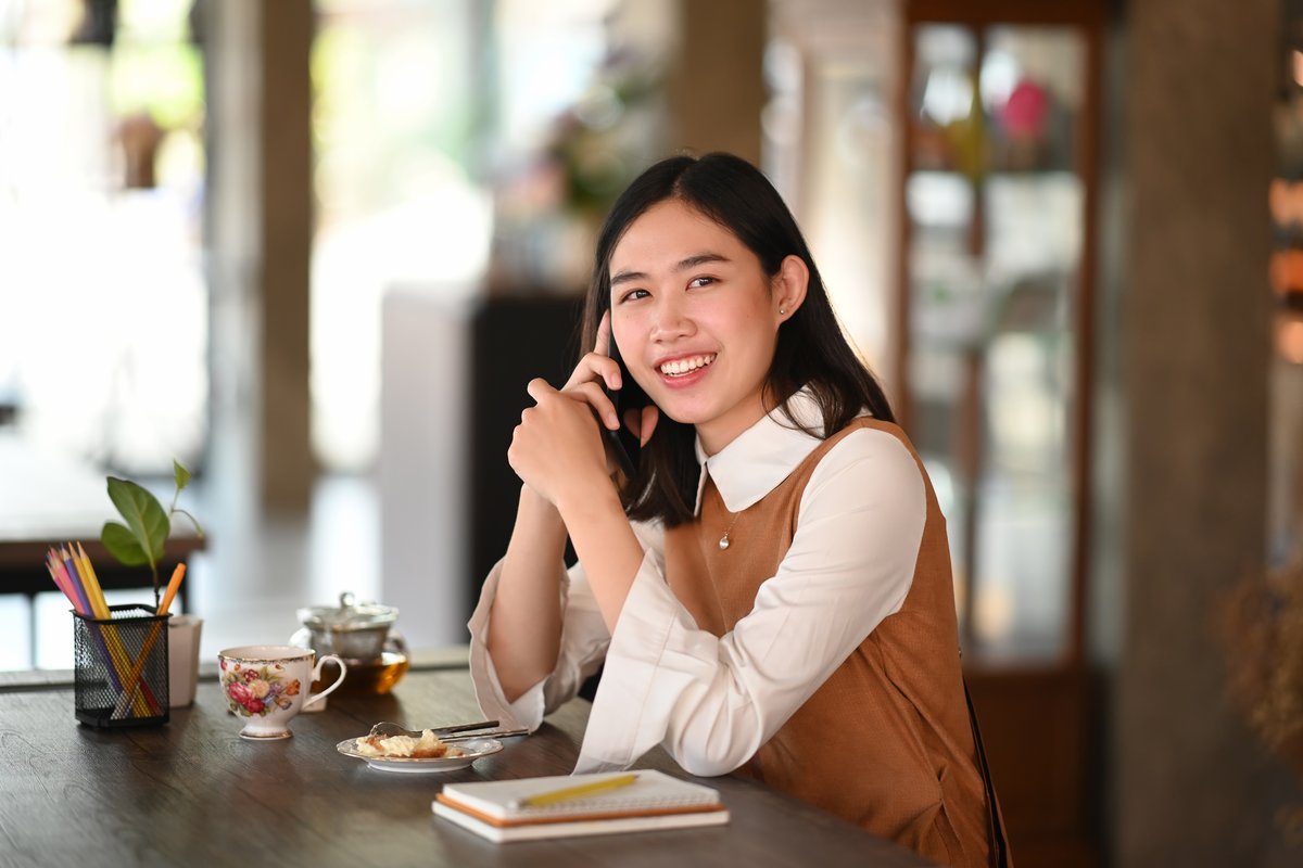 San Gabriel Valley resident controlling smart home devices from her phone in Arcadia